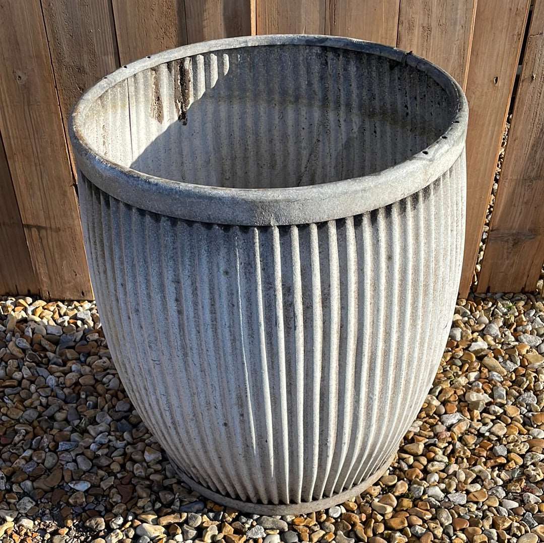Vintage zinc dolly tub with fluted sides.