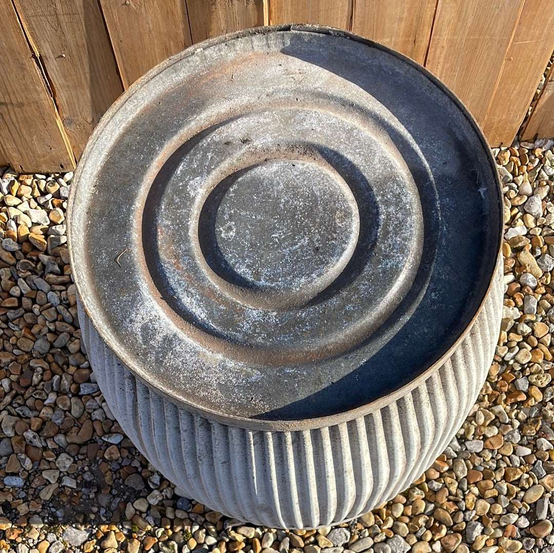 Vintage zinc dolly tub with fluted sides.