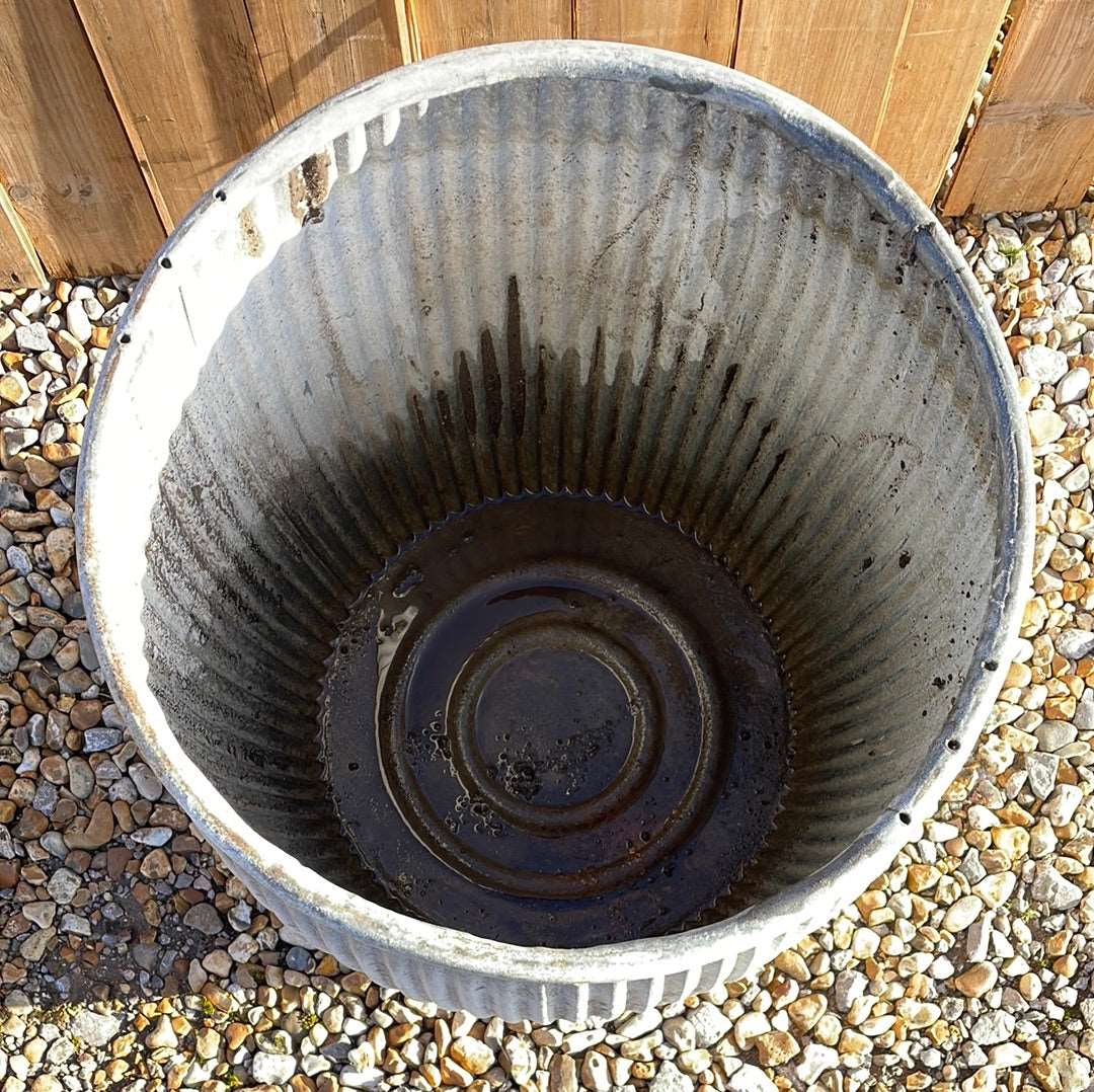 Vintage zinc dolly tub with fluted sides.