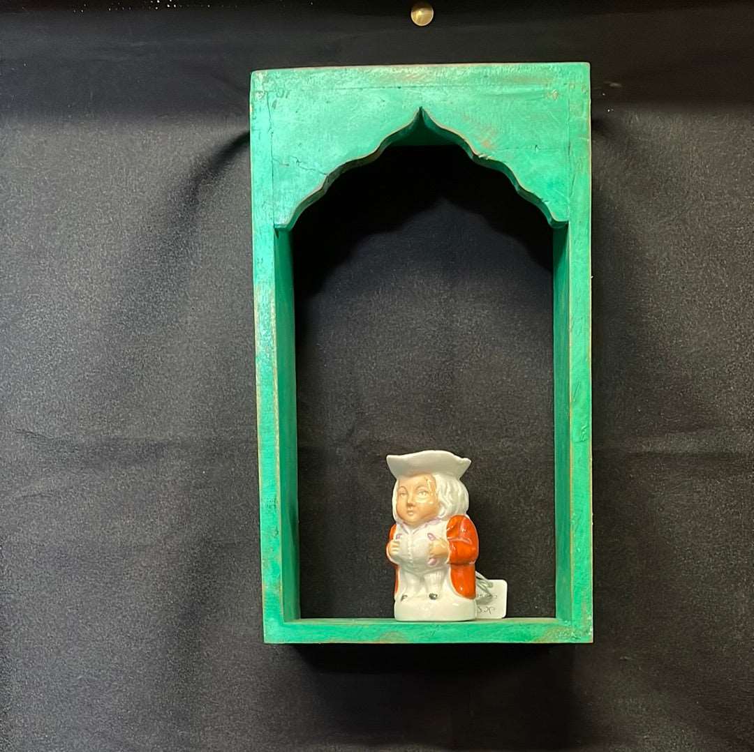 Single Indian wooden temple arch shelf green distressed finish.