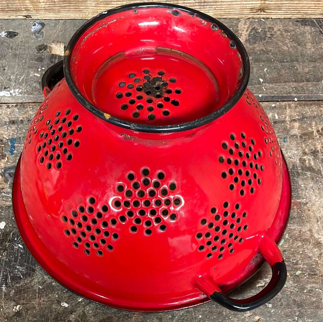 Enamelled metal red and white cullender.