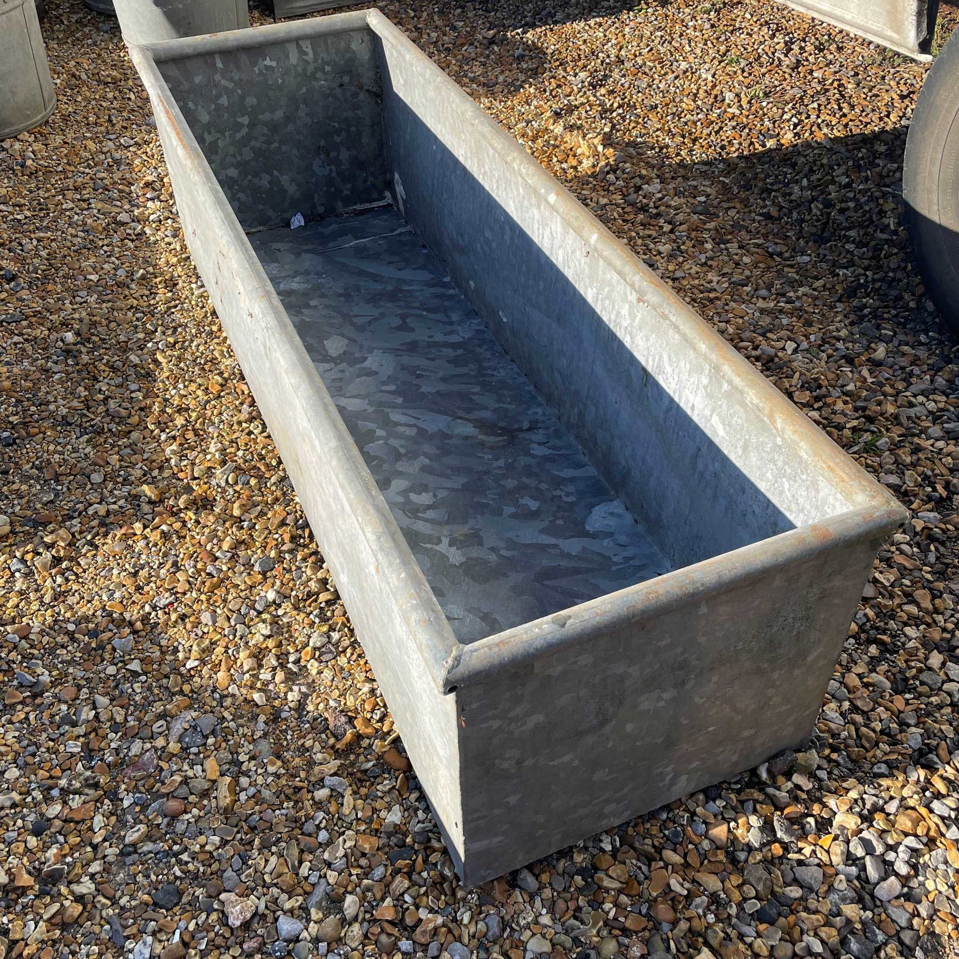 Galvanised water trough planter water feature.