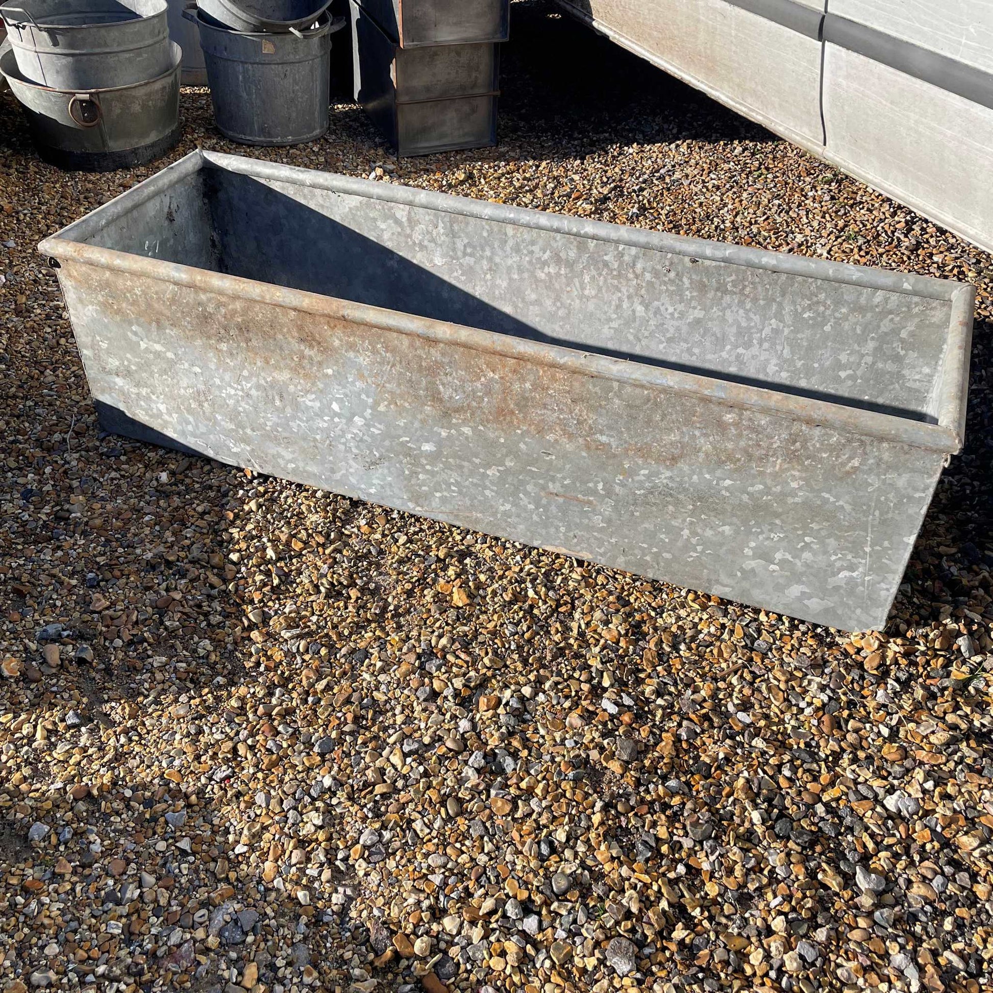 Galvanised water trough planter water feature.