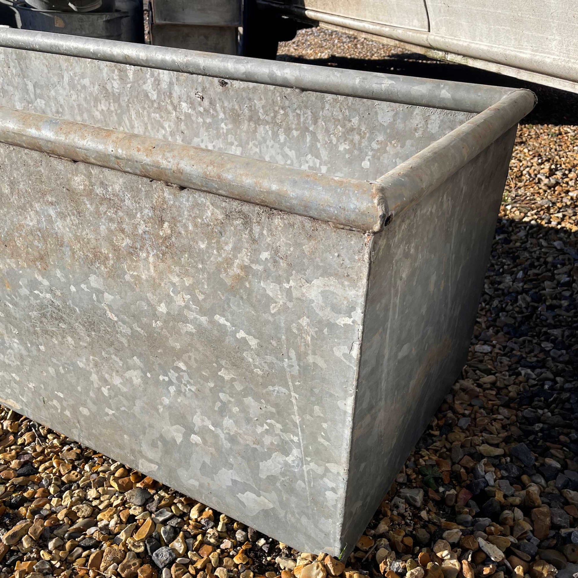 Galvanised water trough planter water feature.