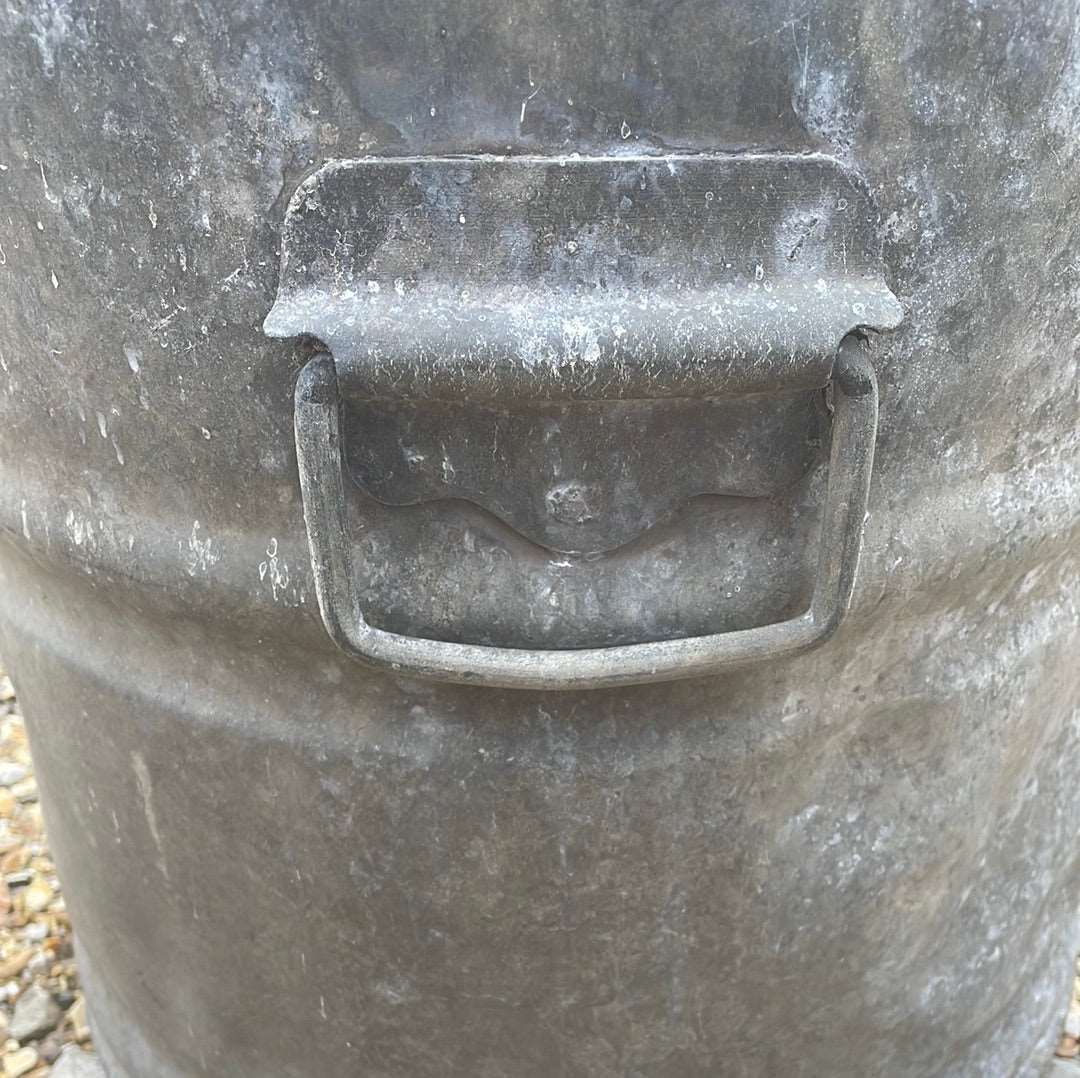 Small galvanised dustbin with lid.