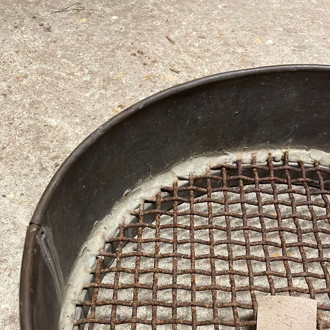 Heavy sided vintage metal garden sieve.