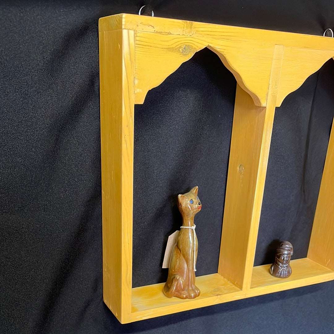 Wooden Indian temple style double sided shelf, orange.