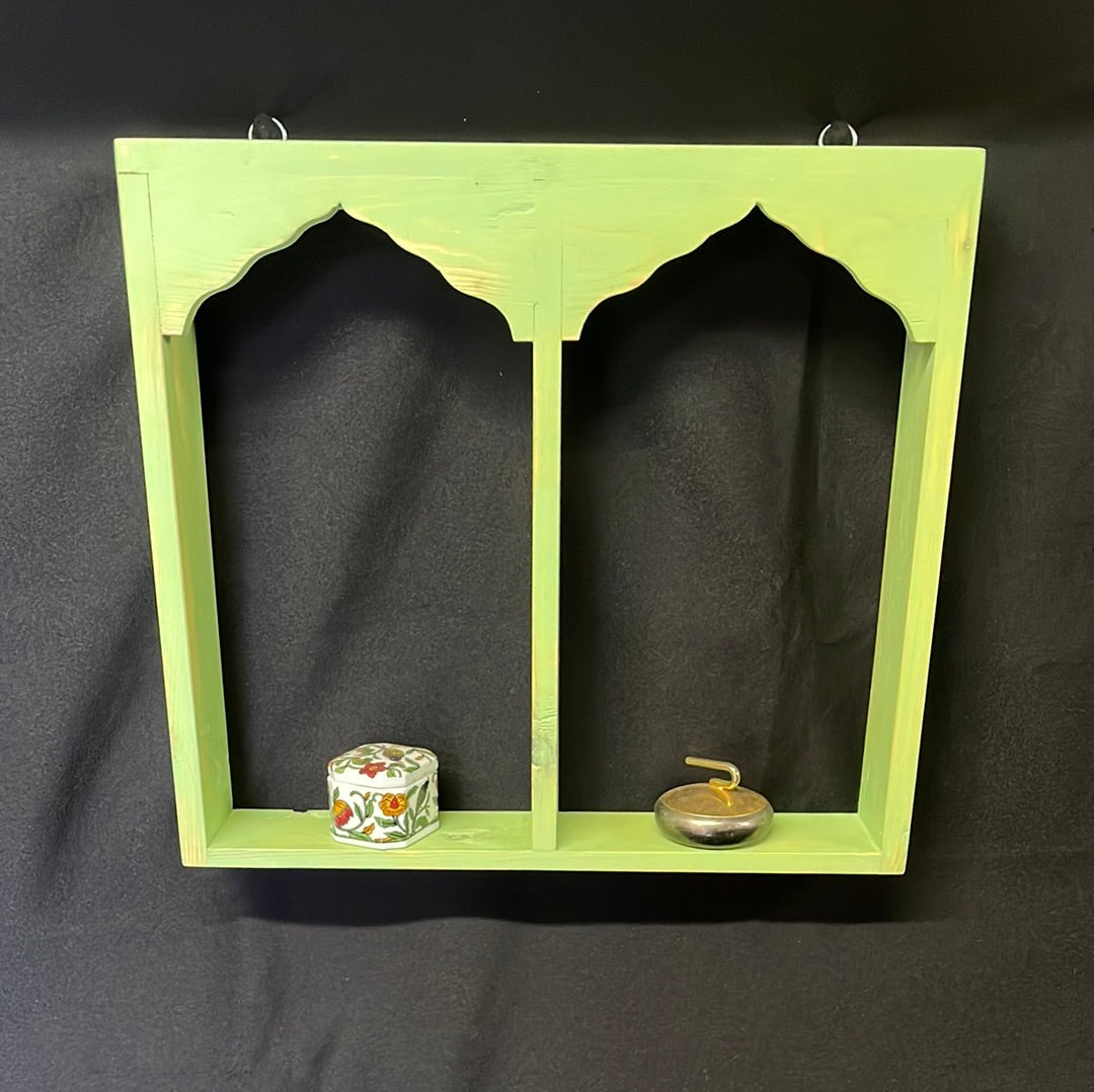 Wooden Indian temple style double sided shelf, light green.