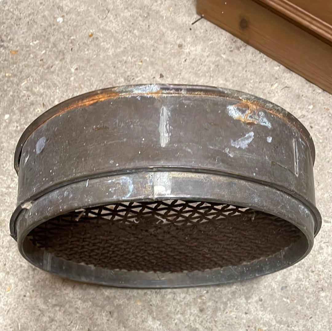 Heavy sided vintage metal garden sieve.