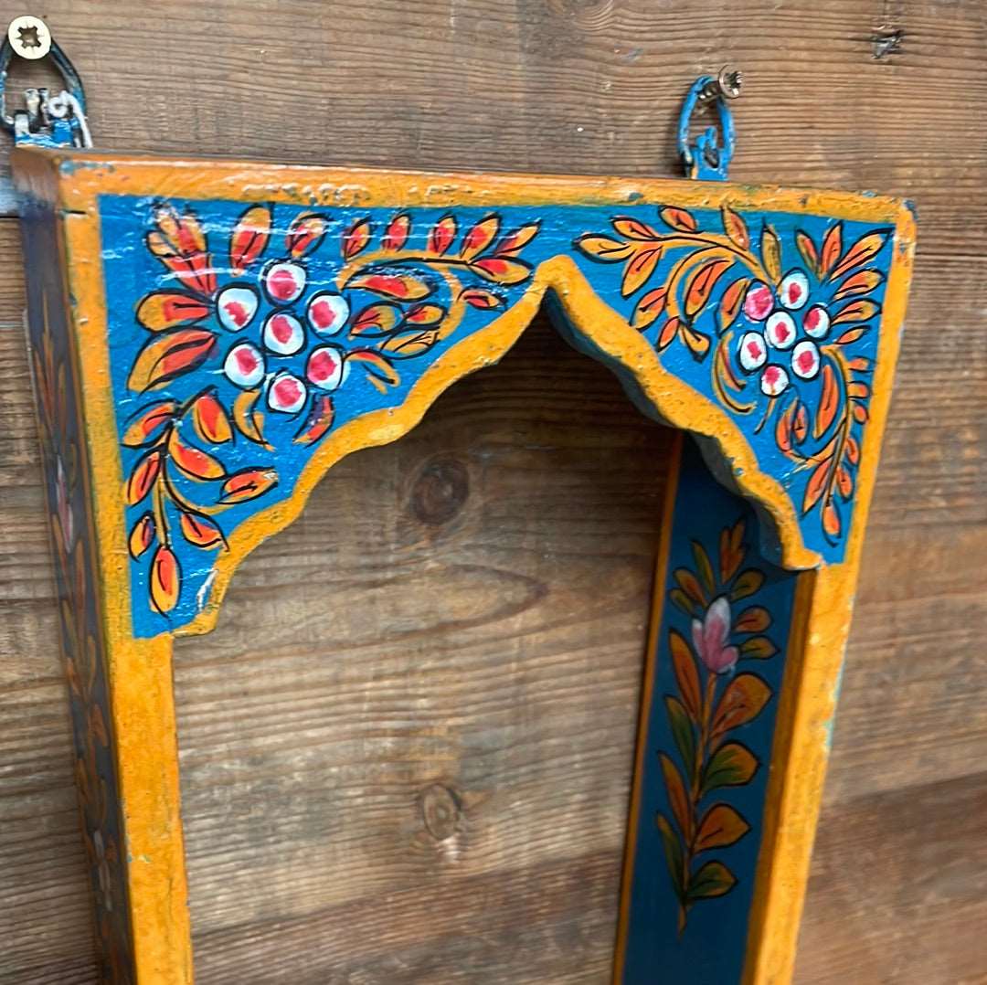 Indian painted decorative single arch temple shelf.
