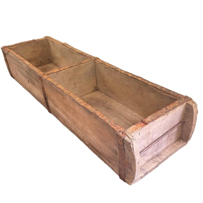 A double Indian brickmould on a white background.