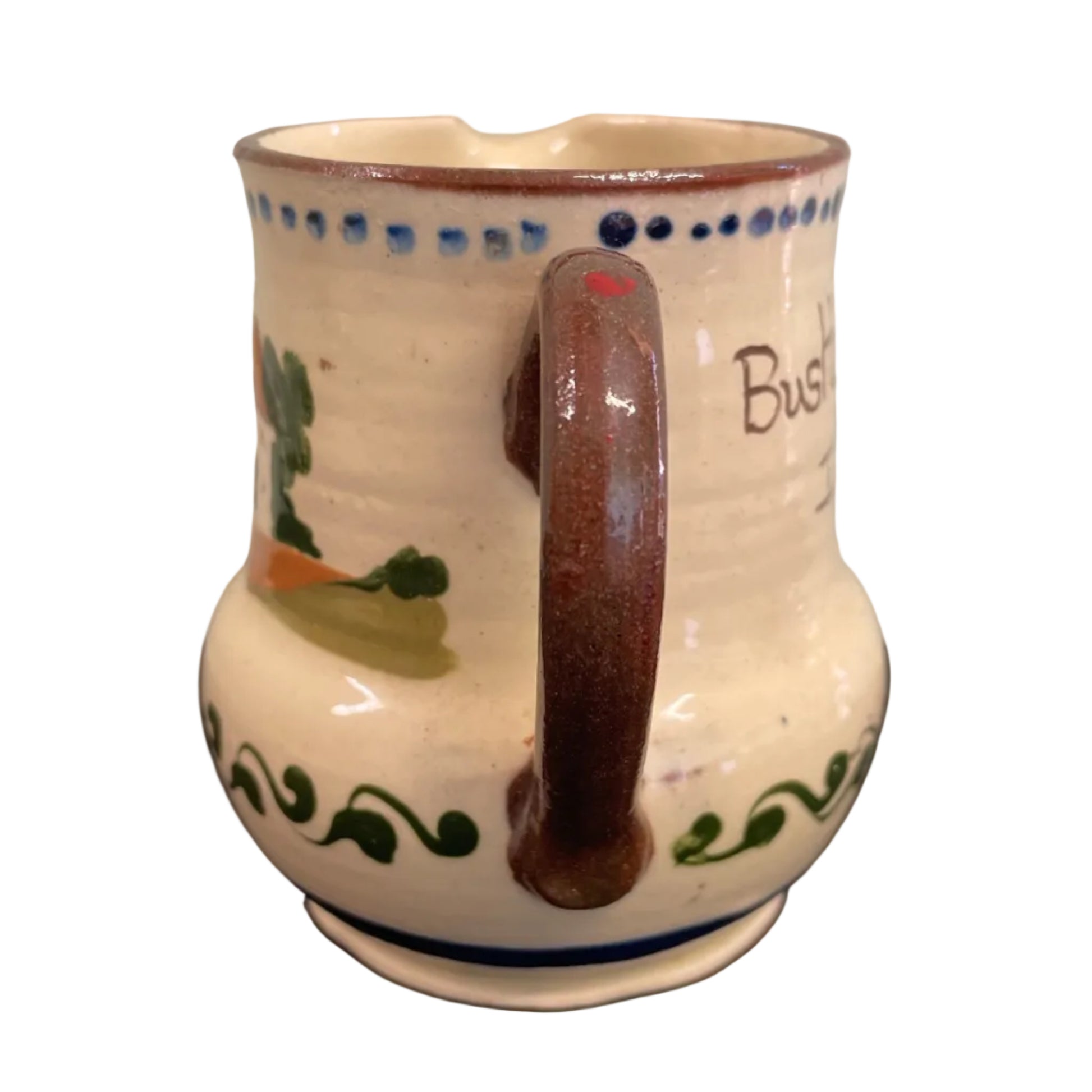 A vintage Watcombe Torquay motto ware cream jug.