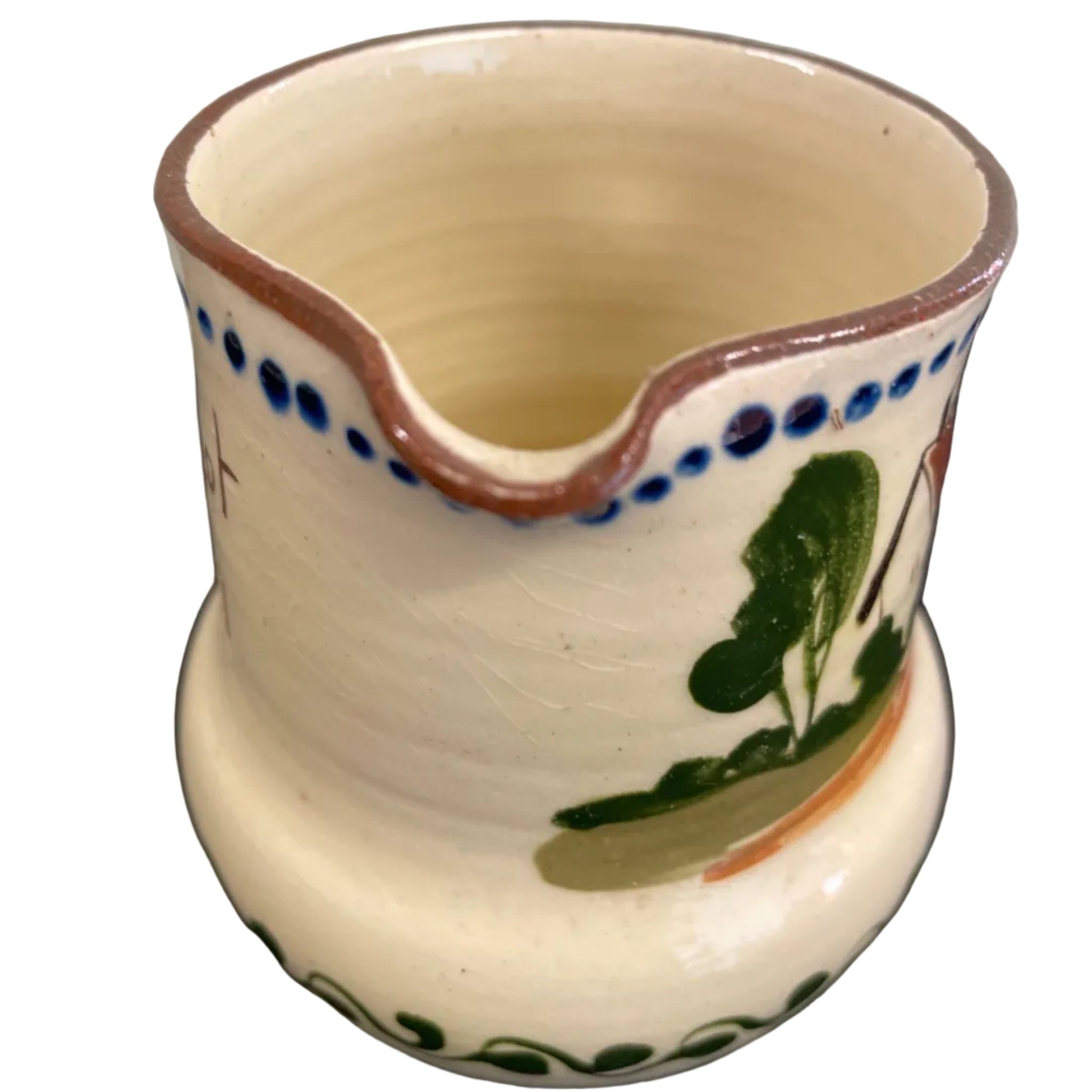 A vintage Watcombe Torquay motto ware cream jug.