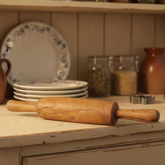 Indian wooden rolling pin on a cottage kitchen dresser.