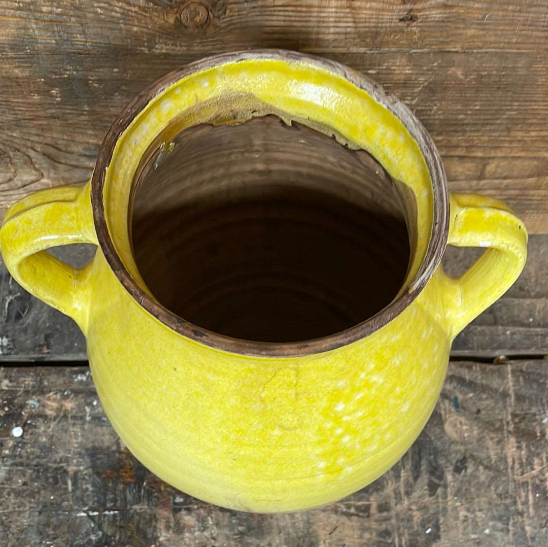 Hungarian hand thrown terracotta part glazed urn pot with two handles.