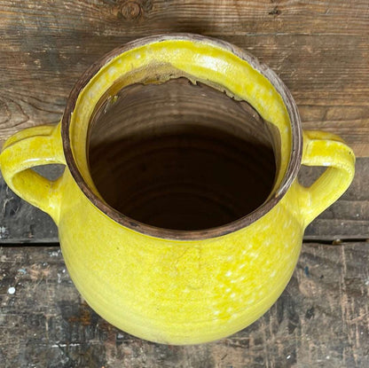 Hungarian hand thrown terracotta part glazed urn pot with two handles.