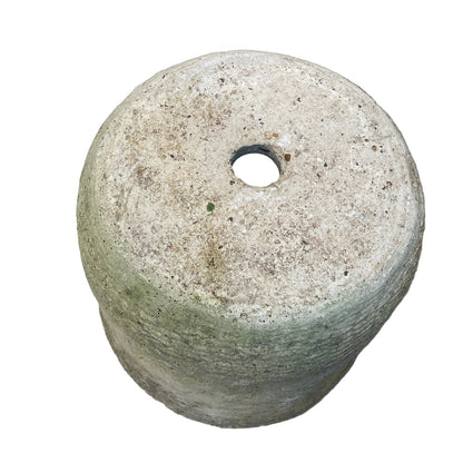 Ornate concrete planter with geometric pattern against a white background.