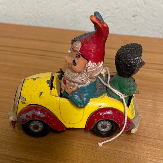 Vintage corgi noddy and big ears car on wooden table.