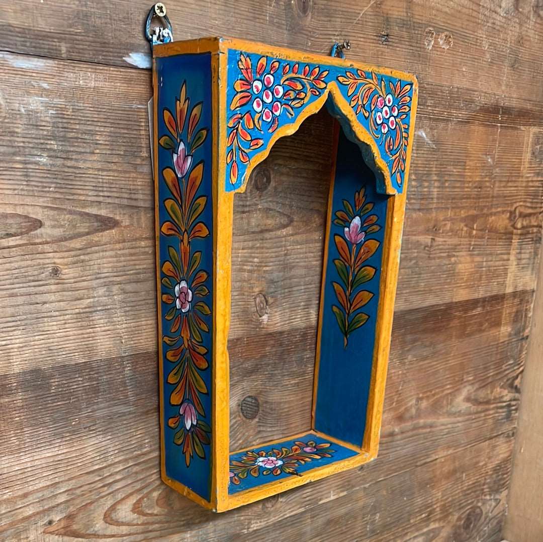 Indian painted decorative single arch temple shelf.