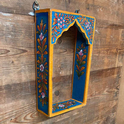 Indian painted decorative single arch temple shelf.