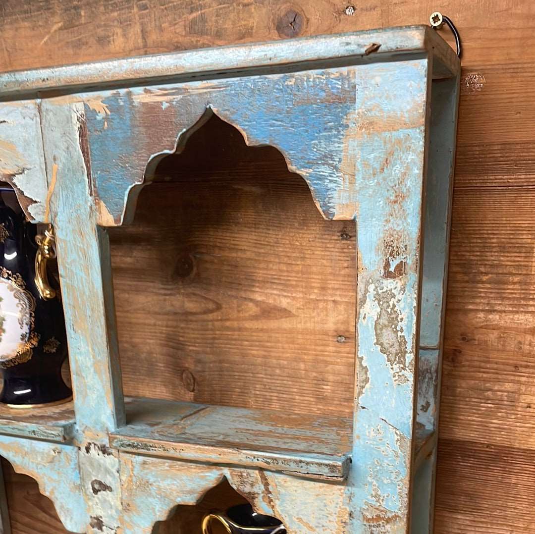 Indian arched temple shelf four compartments distressed blue finish.