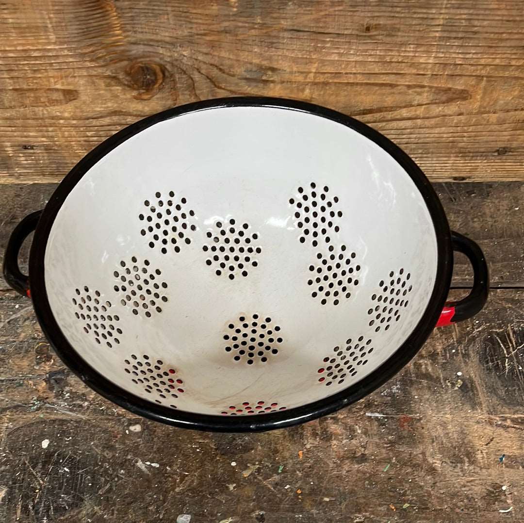 Enamelled metal red and white cullender.