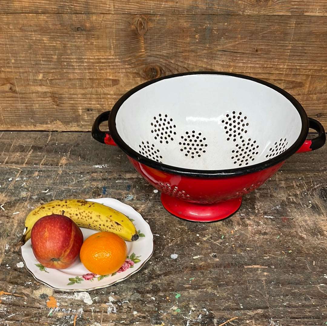 Enamelled metal red and white cullender.