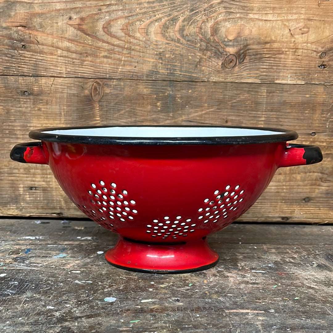 Enamelled metal red and white cullender.