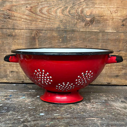 Enamelled metal red and white cullender.