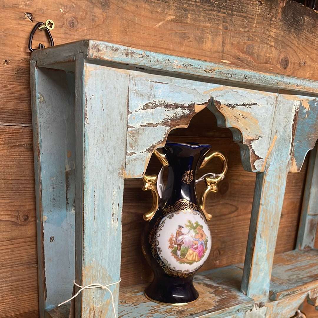 Indian arched temple shelf four compartments distressed blue finish.