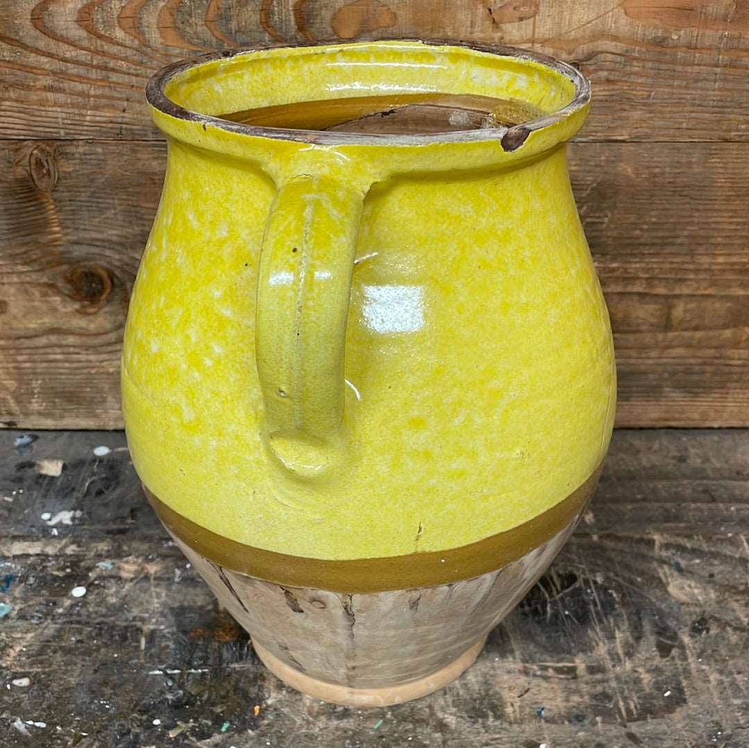 Hungarian hand thrown terracotta part glazed urn pot with two handles.