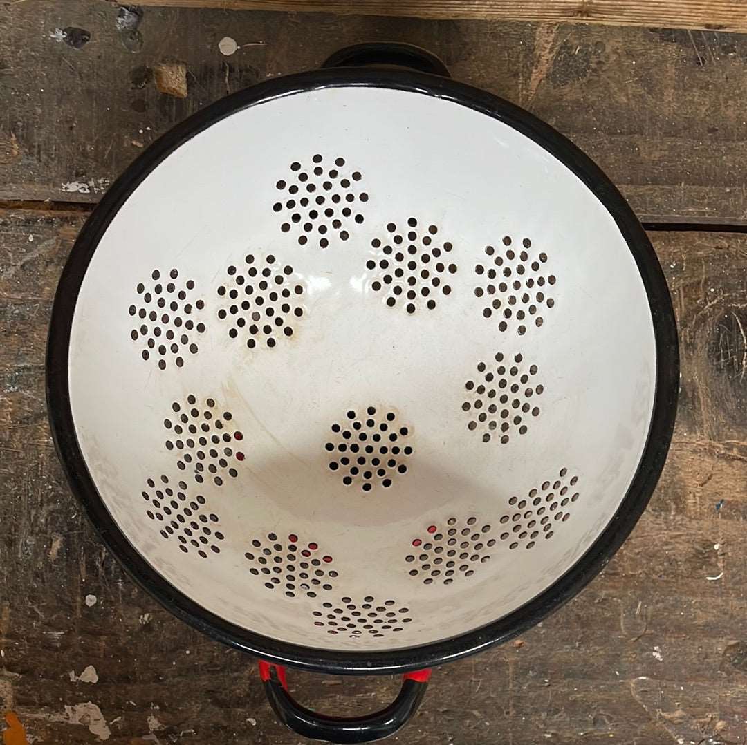 Enamelled metal red and white cullender.