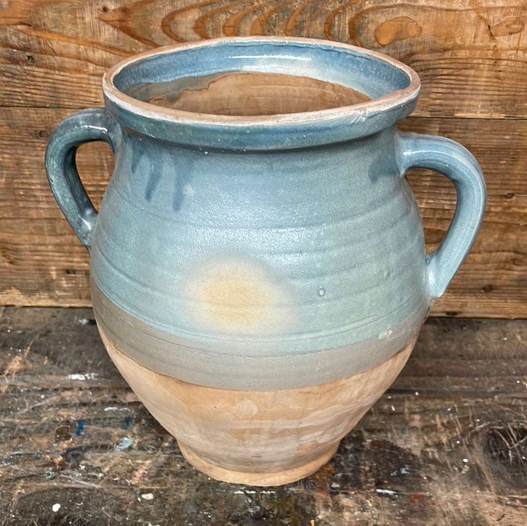 Hungarian hand thrown terracotta part glazed urn pot with two handles.