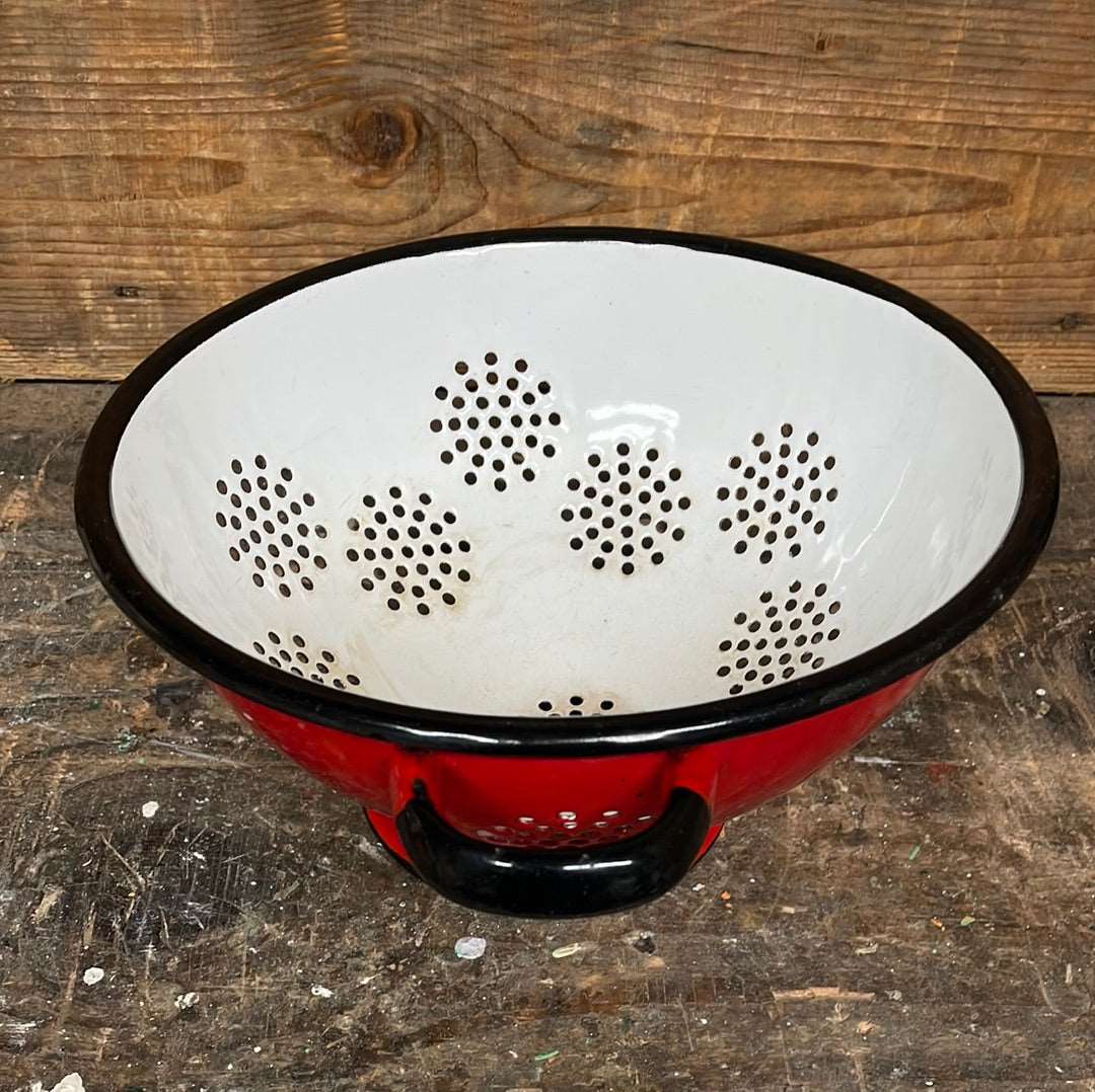 Enamelled metal red and white cullender.
