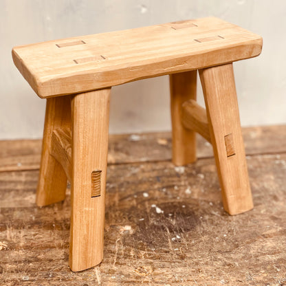 Mini cherrywood handcrafted 4 legged stool.