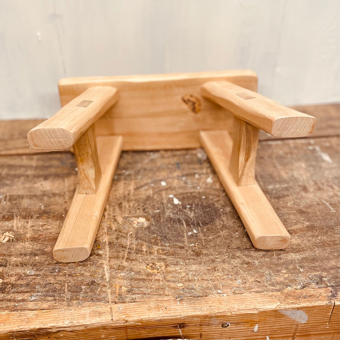 Mini cherrywood handcrafted 4 legged stool.