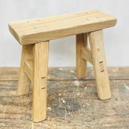 Mini handcrafted 4 legged oak wood stool.