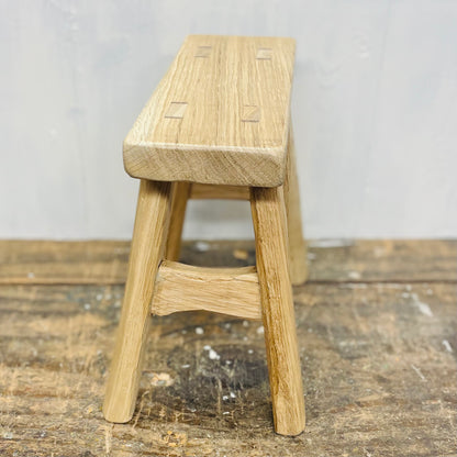 Mini handcrafted 4 legged oak wood stool.