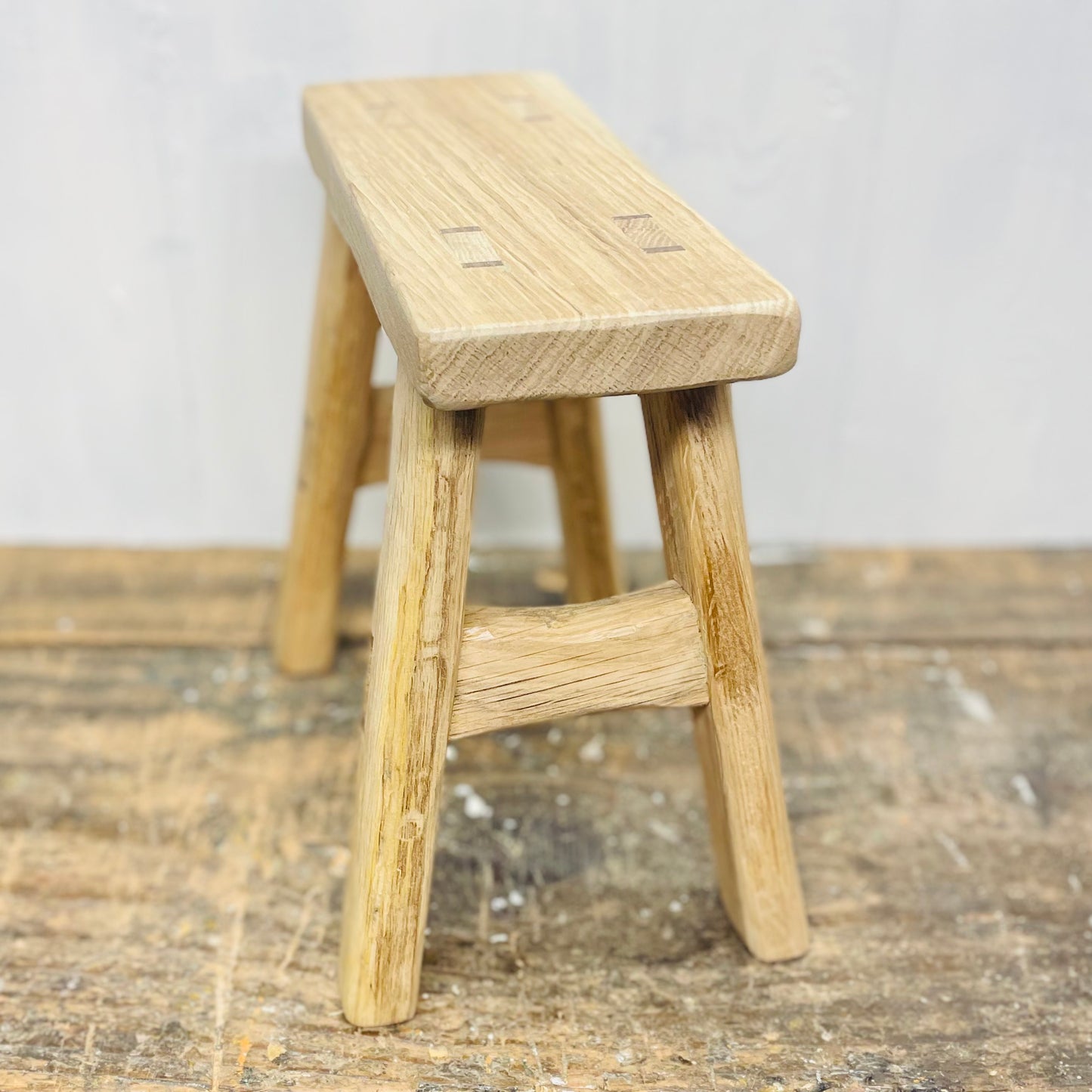 Mini handcrafted 4 legged oak wood stool.