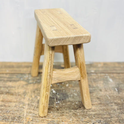 Mini handcrafted 4 legged oak wood stool.