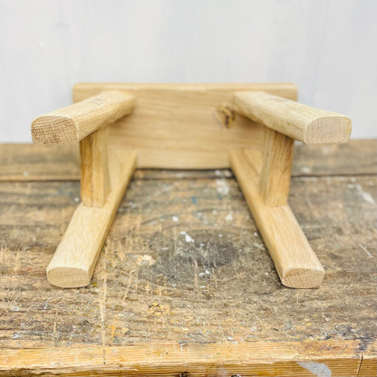 Mini handcrafted 4 legged oak wood stool.