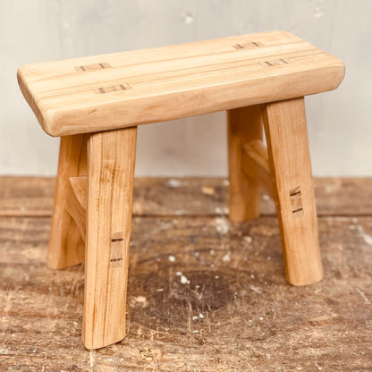 Mini handcrafted 4 legged cherrywood stool.