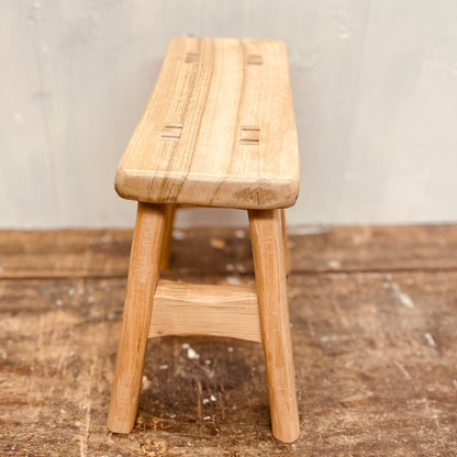 Mini handcrafted 4 legged cherrywood stool.