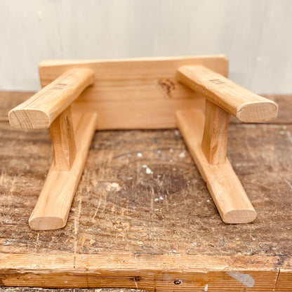 Mini handcrafted 4 legged cherrywood stool.