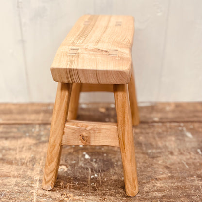 Mini 4 legged cherrywood handcrafted stool.