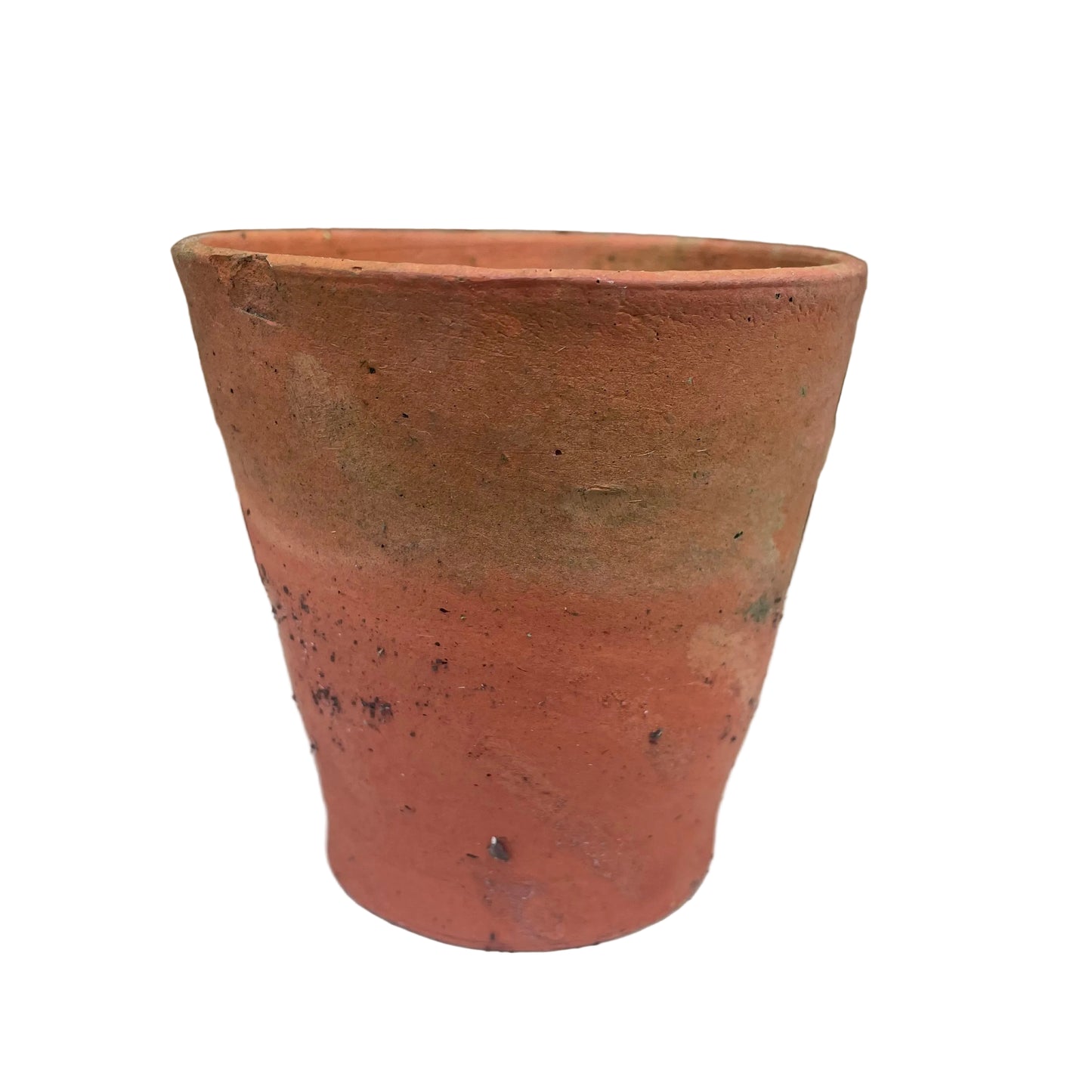 Terracotta pot on a white surface