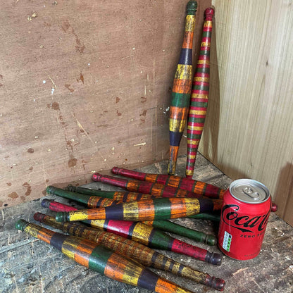 Selection of wooden painted rolling pins.
