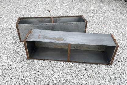Large metal rectangular trough planter.