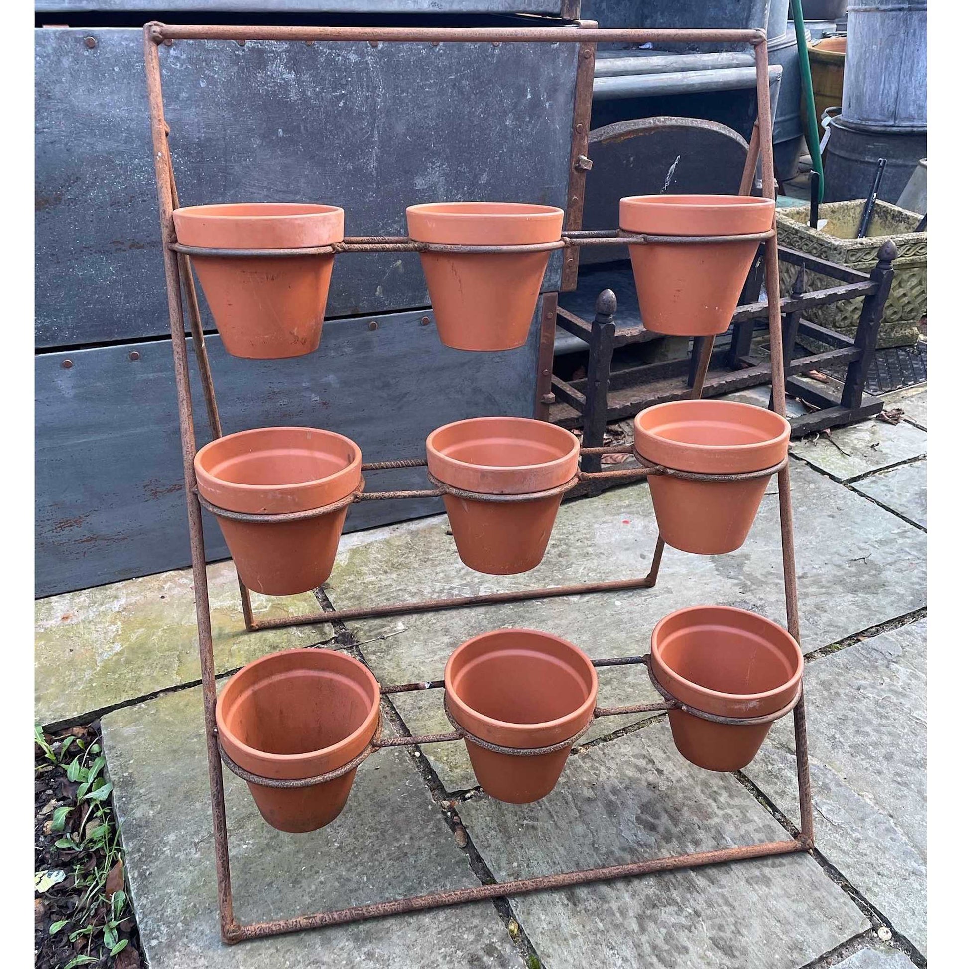 Metal tiered plant theatre pot stand 9 pot
