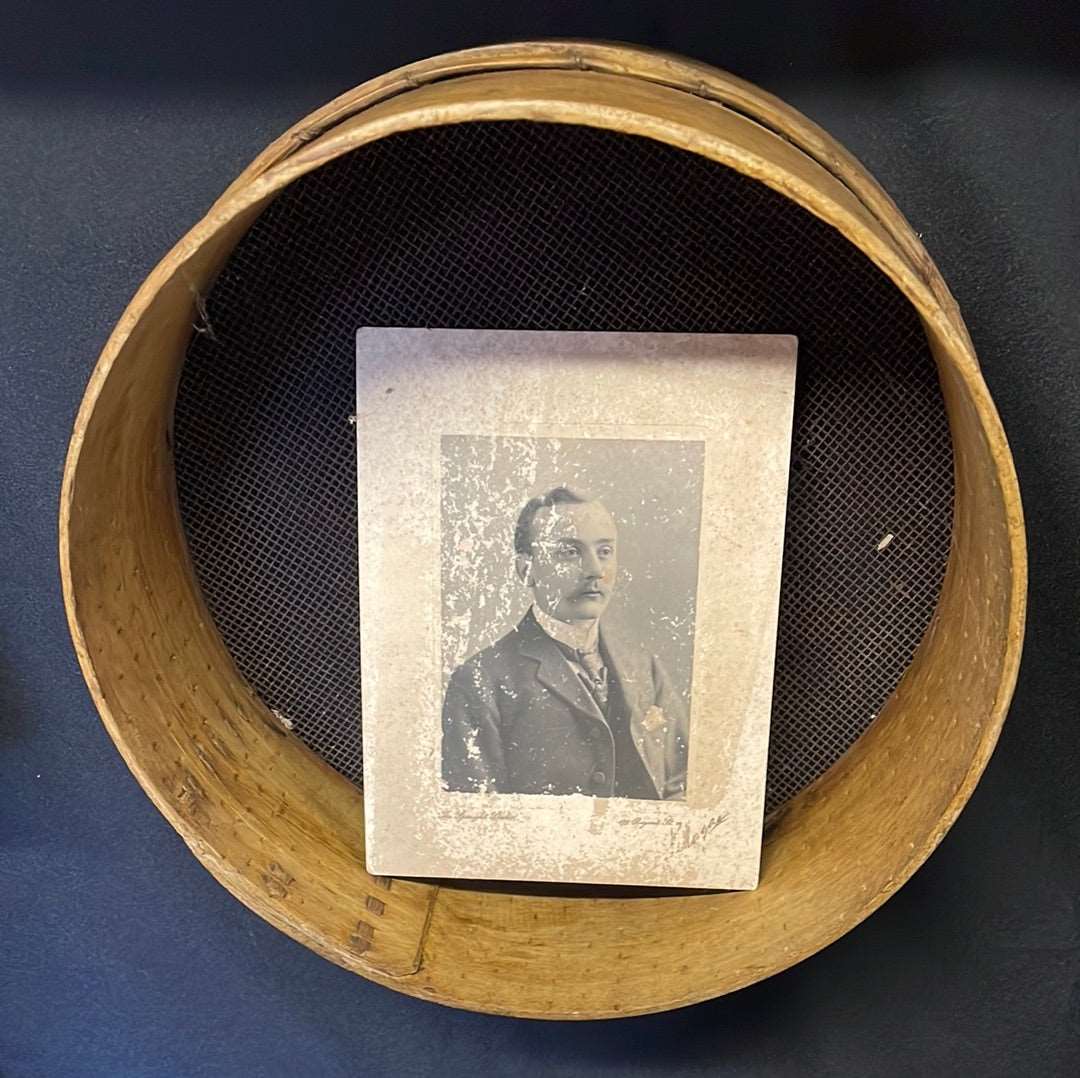 Vintage wooden sided grain sieve.